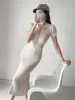 Elegante Vestido Europeo y Americano de Cola de Pez de Manga Corta Verano Nuevo Vestido Suéter con Cuello Polo Ajustado Cintura Ceñida Adelgazante Vestido Tejido