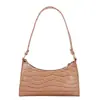El popular bolso texturizado de este año para mujer, nuevo modelo de otoño 2026, bolso de hombro de color liso con patrón de cocodrilo, bolso de moda para llevar debajo del brazo