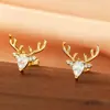 Pendientes de Reno de Navidad Exquisitos Cao Shi para Mujer Douyin Nuevo Estilo Navideño Astas Pendientes de Zirconia en Forma de Gota Microincrustada