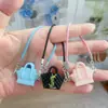 Casa de Muñecas Mini Dibujo Animado Creativo Bolso Colgante Modelo DIY Colgante de Cuello Muñeca de Felpa Accesorio