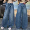Jeans feminino americano retrô de corte solto e curvo, novo modelo primavera e outono 2026, calças de atacado transfronteiriço para crianças mais velhas