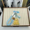 Nueva Cadena para Teléfono Móvil Llavero Colgante para Bolso de Oro Puro 999Kt Gato Sanrio Perro Canela Kuromi Melody