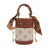 Bolso Transfronterizo para Niños Otoño e Invierno Nuevo Moda Europea y Americana Letra Mini Bolso Cilindro Exquisito Bolso Cruzado de Cadena para Niñas Moderno