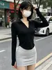 Camiseta de manga larga con dobladillo en forma de U para mujer, diseño de otoño e invierno, ajustada, sexy, top de chica hot, camisa base corta con cuello polo para mujer