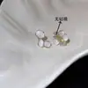 Pendientes de perlas de nicho 925 exquisitos, elegantes pendientes de mariposa y flores que combinan con todo, ligeros y lujosos pendientes de alta gama.