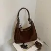 Bolsa de mão vintage outono e inverno para mulheres 2026 nova bolsa tiracolo de camurça vintage para o dia a dia e uso casual, bolsa de bolinho