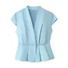 Venta al por mayor de ropa para mujer transfronteriza: Nuevo conjunto de moda de verano, top plisado simple y elegante + falda de color liso con abertura