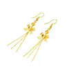 Aretes Chapados en Oro con un Diseño de Moda Único con Estrellas y Notas Musicales, un Accesorio Sencillo de Estilo Largo para Niñas, con Borlas Doradas para un Aspecto Elegante