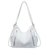 Bolsa Feminina Estilo Motociclista Vintage 2026 Nova Tendência Moda Bolsa de Ombro Textura de Nicho Grande Capacidade Bolsa Tote de Ombro