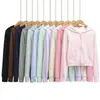 Chaqueta cárdigan corta con capucha para mujer, nuevo modelo de otoño 2026, color liso, bolsillos grandes, cierre de cremallera, corte ajustado, sudadera casual
