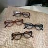 Nueva caja de gafas transparente estudiantes miopía hombres y mujeres planas red roja grande cara redonda gafas anti-luz azul al por mayor