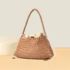 Bolso tejido de diseño nicho coreano de alta gama para mujer, bolso de hombro y axila de gran capacidad, bolso de mano versátil y moderno para mujer