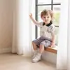 Conjunto de Ropa para Niño 2026 Nuevo Estilo Moda para Bebé Camisa Polo con Cuello Campana Graffiti Manga Corta Conjunto de Dos Piezas para Niño Pequeño Moderno