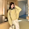 Chamarra de cuero proteico amarillo estilo coreano de dos piezas falsas, nueva colección 2026, sudadera corta de manga larga con capucha para mujer, adecuada para primavera y otoño