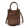 2026 Nova Bolsa Mini Moto Vertical para Mulheres Sensação de Alto Padrão Textura Plissada Bolsa de Mão Bolsa Transversal para Celular Tendência