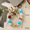 Dopamina Muñeca Popular Bonita con Cuentas Cadena para Teléfono Móvil Colgante Joyería Regalo Llavero Portátil Anti-Pérdida