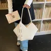 Bolsa Tote para o Trabalho, Bolsa de Grande Capacidade, Nova Bolsa de Ombro Feminina 2026 Primavera/Verão, Textura de Alta Qualidade, Cor Contrastante, Bolsa de Mão