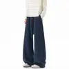 Calça curva masculina com padrão de escamas de dragão texturizado estilo americano, marca moderna, modelagem solta, com caimento fluido, calça casual de perna larga para o outono