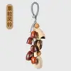 Al por mayor I4 Bosque de Yunnan - Temática de Sanación Carcasa Natural de Fruta Carrillón de Viento Vaina de Frijol Campana de Mano Semillas Carrillón de Agua Cobre Alivio del Estrés Artículos Pequeños