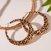 Europa y Estados Unidos pendientes de pin de acero con círculo geométrico de leopardo transfronterizo, personalidad exagerada, temperamento nicho, pendientes de alta gama para mujer