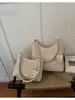 Bolsa de Hombro/Axila Versátil de Moda Exquisita de Diseño de Nicho de Gama Alta para Viajes de Negocios de Verano 2026