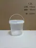 Cubo de plástico redondo cuadrado portátil 2L transparente grado alimenticio PP cubo de yogur 1L cubo de arroz engrosado especificaciones de juguete ordenadas