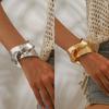 Europa y Estados Unidos moda transfronteriza sentido de diseño simple pulsera abierta lisa nicho retro pulsera geométrica hueca adornos para mujer