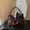 Bolso de hombro tipo tote grande de cuero suave estilo coreano, nuevo bolso de hombro para el trabajo primavera-verano 2026, bolso de mujer simple y casual