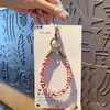 Corda de telefone versátil, corrente para celular, pulseira de pulso de TPU colorida, estilo europeu e americano, cordão de capa de telefone durável anti-perda