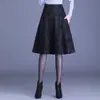 Falda de cuadros de línea A de longitud media, estilo otoño 2022, de cintura alta, ajustada, falda de media pierna a la moda, falda acampanada elegante, efecto adelgazante