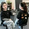Camiseta de manga larga para niña 2026 primavera y otoño, top elegante para niñas pequeñas, aspecto de dos piezas, camiseta base de algodón puro para niños