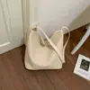 Shuai Mijia 2026 Verano Nuevo Bolso de Mujer Gran Capacidad Color Sólido Bolso de Hombro de Moda Patrón Tejido Bolso Cubo de Axila