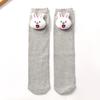 Nuevos calcetines altos para niños bordado de cabeza de muñeca cabeza de conejo lindo Joker color liso niños grandes calcetines altos fabricantes venta al por mayor