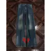 Estilo retro americano + color blockNuevo diseño jeans para hombre de corte limpio con tres rayas