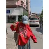Foto real de la nueva sudadera con capucha de diseño de doble cara para el otoño de 2026 con estampados en la parte delantera y trasera, corte holgado y estilo off-shoulder