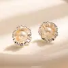 Pendientes de Perla con Flor de Estilo Nacional de Seiko Familia Shi Temperamento Elegante Pendientes de Nicho 2026 Nuevas Joyas para Orejas Ligeras de Lujo de Gama Alta