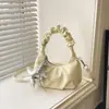 Bolso de mano para mujer 2026 primavera nuevo estilo nicho de moda bolso bandolera con cadena bolso tipo dumplings plisado bolso tote pequeño para el trabajo