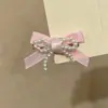Elegante pasador lateral para mujer, pinza de pico de pato con forma de oso para flequillo y frente, nuevo estilo 2026, pequeño accesorio para el cabello estilo Chanel