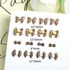 Nueva joyería para uñas tridimensional con diseño de leopardo francés, gato kt, lazo de amor de dibujos animados, joyería para uñas DIY al por mayor