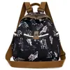 Mochila de Lona Colorida Tendência e Legal Venda Barata Transfronteiriça Mochila de Viagem Dupla Finalidade Feminina Antifurto Tecido Bolsa Escolar para Estudante Feminina