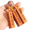 Llavero de coche de madera de melocotón, venta caliente, regalo de madera, colgante de llave de lugar escénico del templo Nanwu Amitabha