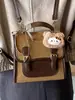 Mochila Simple Retro de Aspecto Elegante Estilo Coreano para Mujer 2025 Invierno Nuevo Estilo Preppy Nicho Bolsa de Viaje Casual
