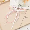 Nuevo Colgante Creativo de Cadena Colgante con Lazo de Perlas para Bolso, Funda de Teléfono, Llavero, Adorno, Exquisito Accesorio de Regalo Pequeño