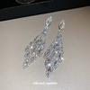 Aretes Colgantes Ovalados de Diamante con Pin Plateado para Mujer Moda Europea y Americana Exagerados Combinan con Todo Aretes de Lujo Ligero Niche Sensación de Alta Gama