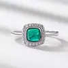 Anillo de esmeralda de nuevo estilo transfronterizo plata S925 incrustado color brillante tesoro anillo abierto para dedo retro europeo y americano lujo ligero