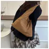 Bolso tote grande de color liso simple estilo coreano ins para mujer, nuevo 2026, versátil, casual, para ir al trabajo, de hombro y debajo del brazo
