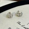 Pendientes irregulares dorados de doble tubo con diseño de nicho simple estilo Hong Kong para mujer, con personalidad diaria, a la moda, combinables con todo.
