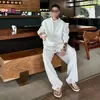 Conjunto Casual Estilo Preguiçoso Falso Duas Peças para Homem, Moda de Alta Qualidade para Primavera, Conjunto de Duas Peças com Moletom de Meio Zíper e Gola Alta e Calça de Moletom
