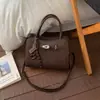 Moda Nova Primavera 2026 Simples Casual Uma Alça Bolsa Quadrada Pequena para Mulheres Estilo Coreano Retrô Nicho Bolsa de Mão Pequena para Mulheres