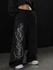 Calça feminina pantalona estilo retrô americano desgastado, cintura alta, com letras de strass, calça jogger de perna larga, uso versátil, calça esportiva casual